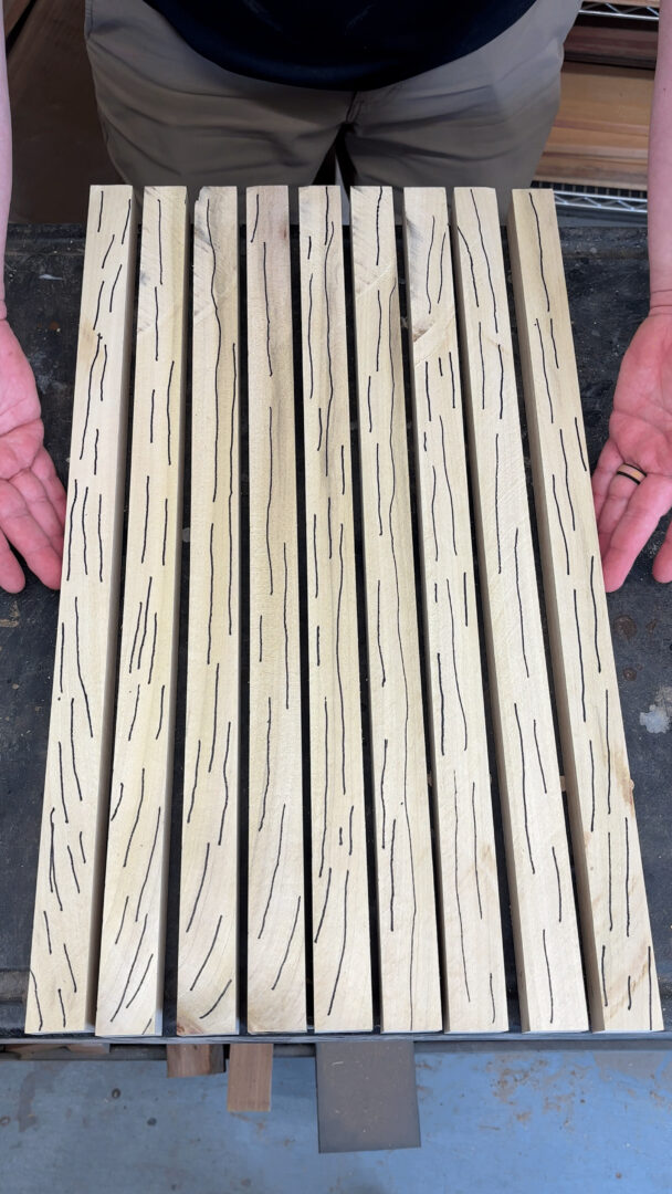 Poplar strips with vertical grain traced out in black